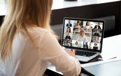 Manager leading a virtual team meeting