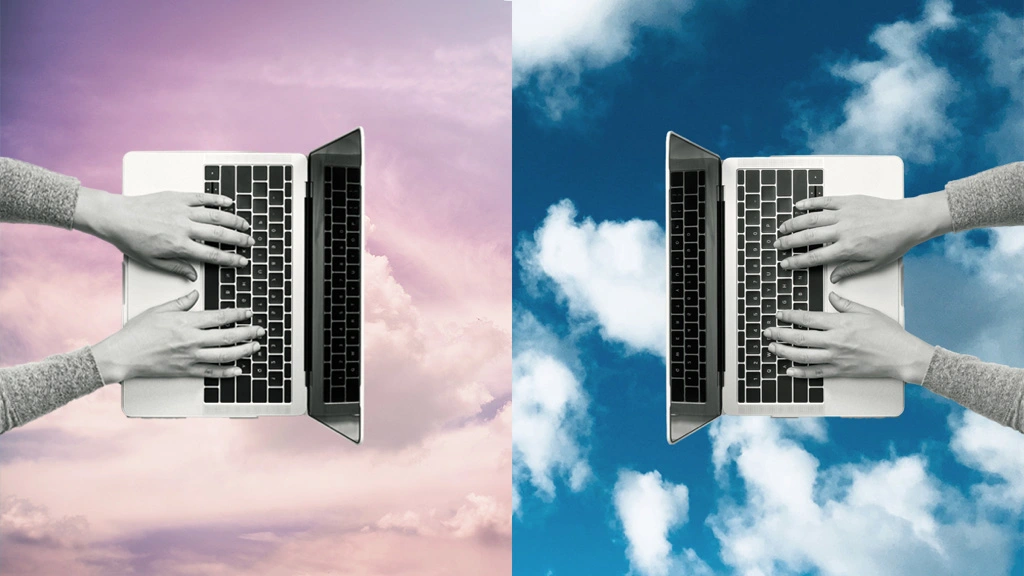 Image of two laptops with clouds behind